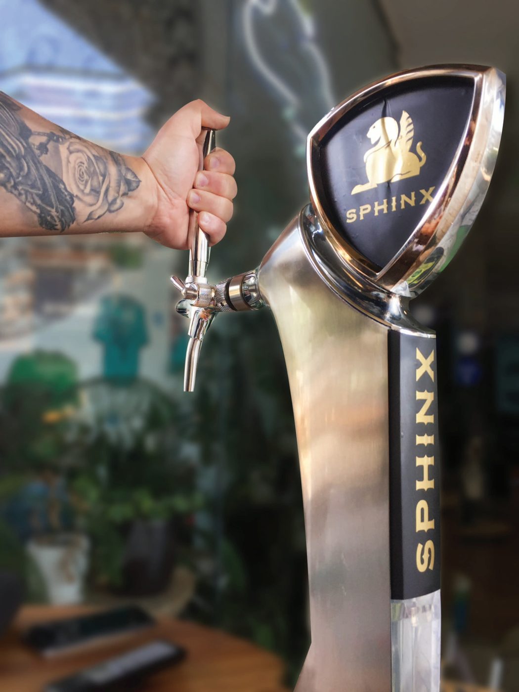 Sphinx sparkling wine tap